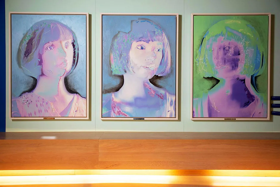 Three of Ai-Da's self-portraits © David Parry/PA