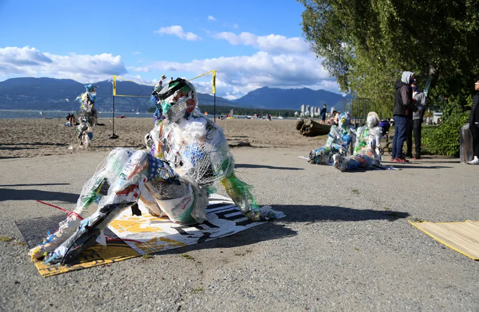 Plastics figures, created by multidisciplinary artist, Caitlin Doherty, and made with plastics removed from Canadian shorelines, are seen at Kitsilano Beach to draw attention to plastic pollution on June 7, 2021 in Vancouver, British Columbia, Canada. (Photo by Mert Alper Dervis/Anadolu Agency via Getty Images)