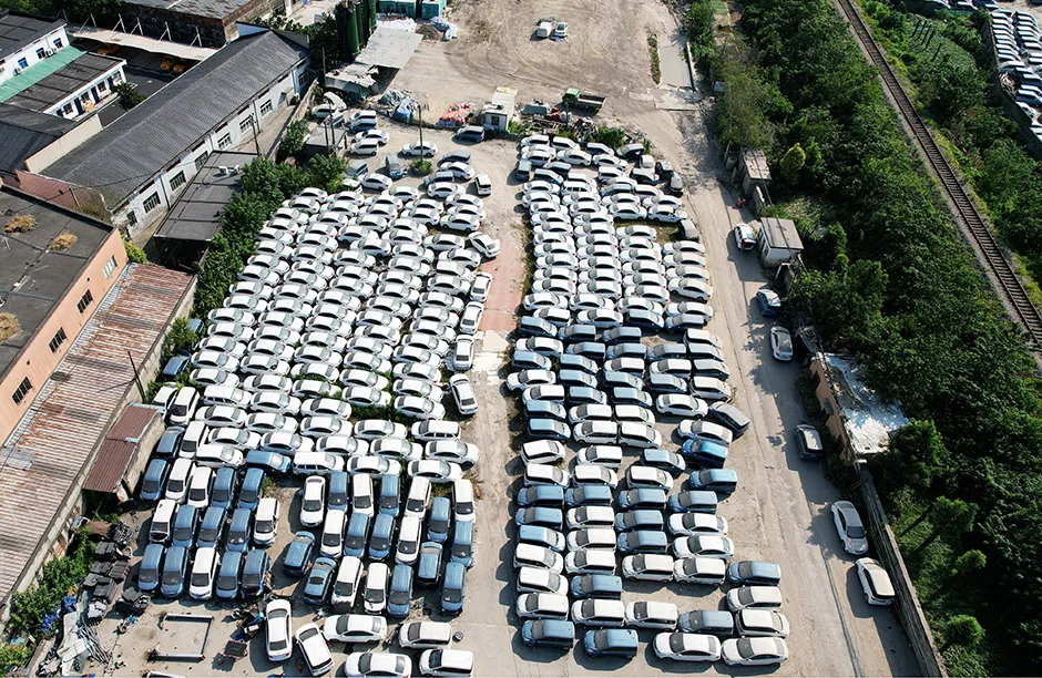 An aerial view of a graveyard of mostly unused new energy vehicles in Hangzhou city in east China's Zhejiang province Wednesday, July 28, 2021. Several such graveyards have been reported recently, probably due to the hefty governmental subsidies on new energy cars in the past. (Photo credit should read Feature China/Barcroft Media via Getty Images)