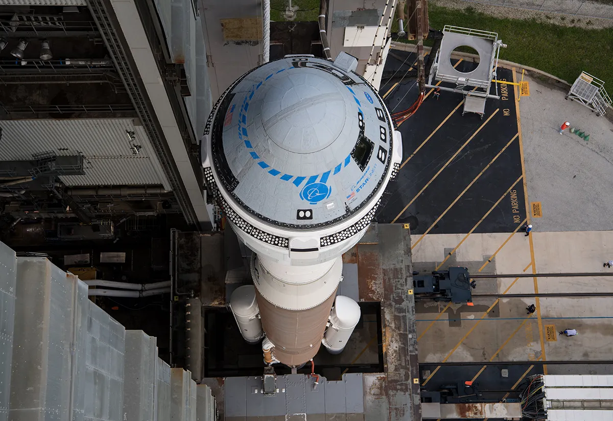 A United Launch Alliance Atlas V rocket with Boeing’s CST-100 Starliner spacecraft aboard is seen as it is rolled out of the Vertical Integration Facility to the launch pad at Space Launch Complex 41 ahead of the Orbital Flight Test-2 (OFT-2) mission, Monday, Aug. 2, 2021 at Cape Canaveral Space Force Station in Florida. Boeing’s Orbital Flight Test-2 will be Starliner’s second uncrewed flight test and will dock to the International Space Station as part of NASA's Commercial Crew Program. The mission, currently targeted for launch at 1:20 p.m. EDT Tuesday, Aug. 3, will serve as an end-to-end test of the system's capabilities. Photo Credit: (NASA/Aubrey Gemignani)