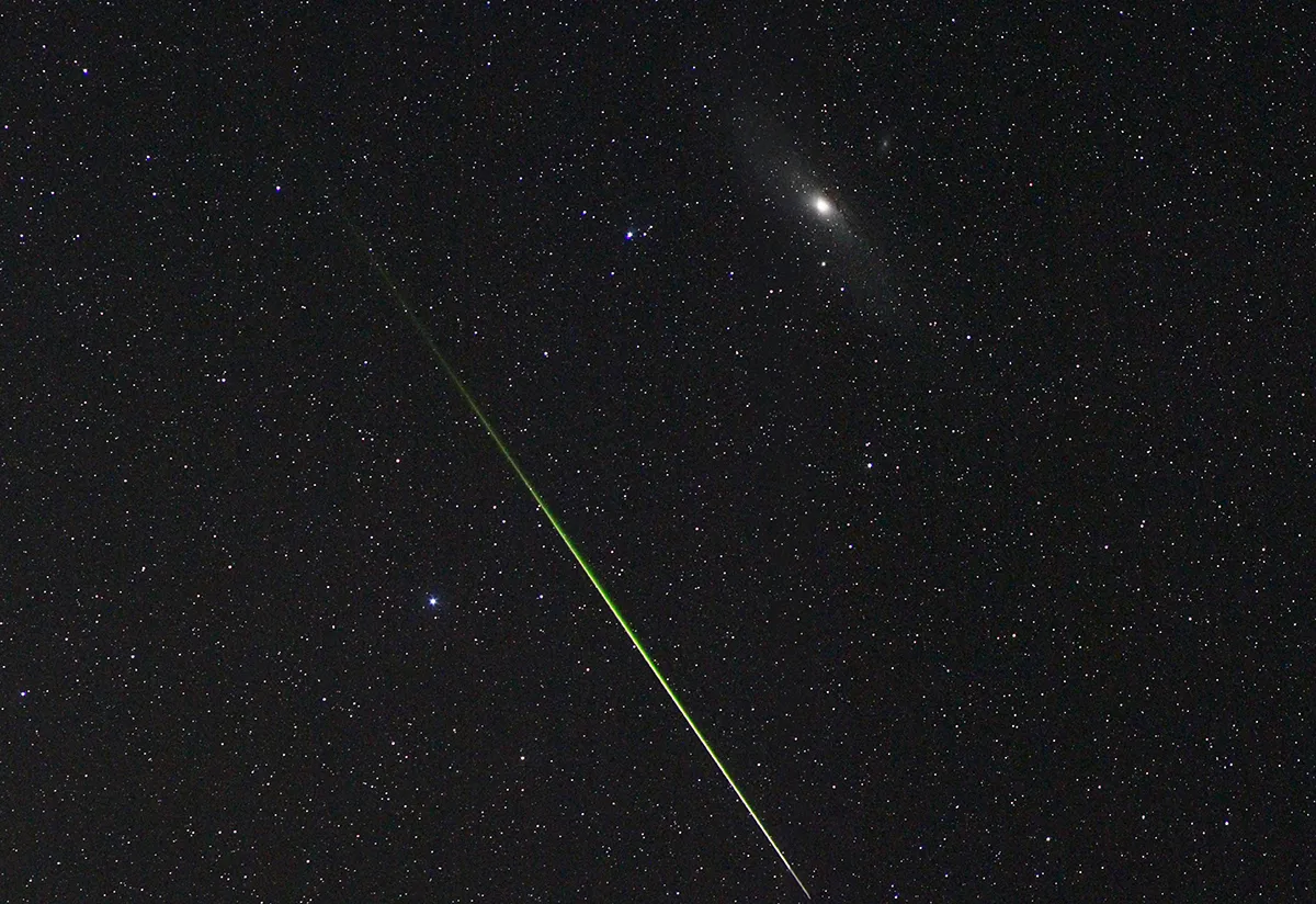 This image of a meteor streaking through the sky was taken at Piano Visitone. Photo by Giuseppe Donatiello