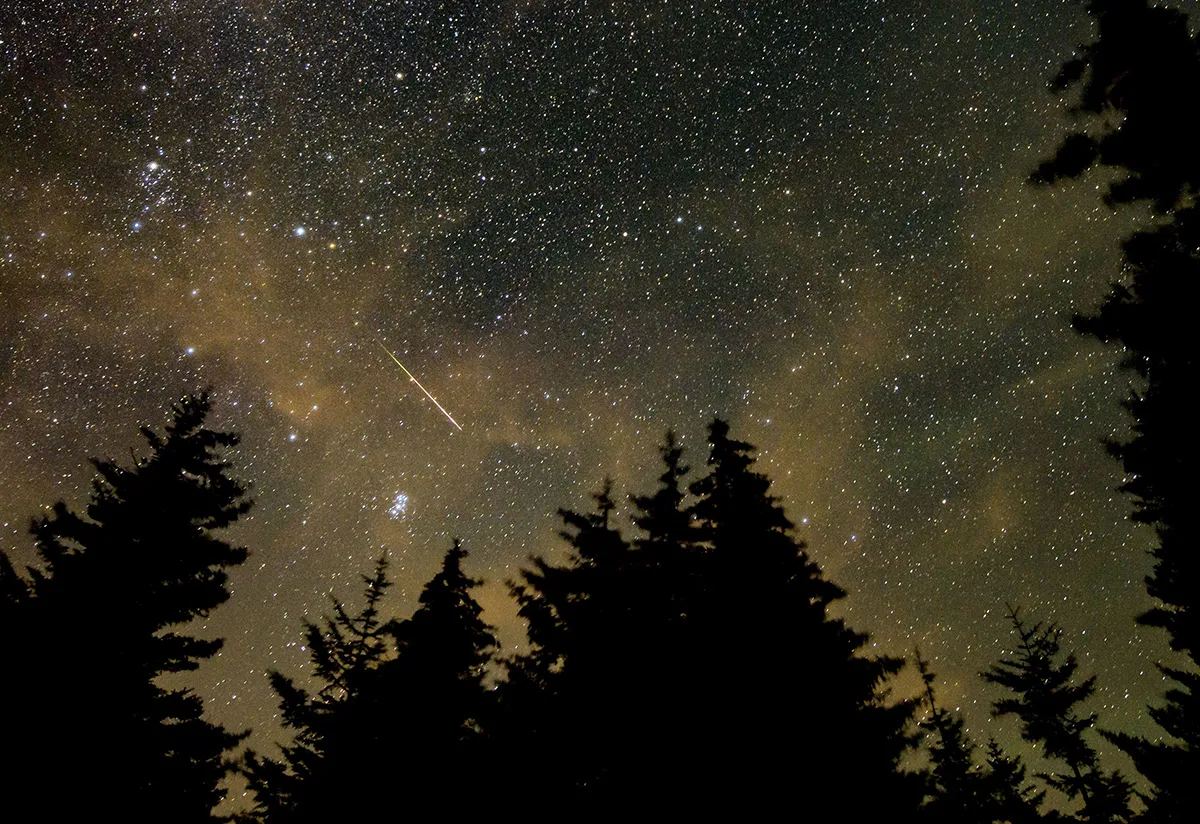 11th Aug, 2021. In this 30 second exposure, a meteor streaks across the sky during the annual Perseid meteor shower, on Wednesday, August 11, 2021, in Spruce Knob, West Virginia. NASA Photo by Bill Ingalls/UPI Credit: UPI/Alamy Live News