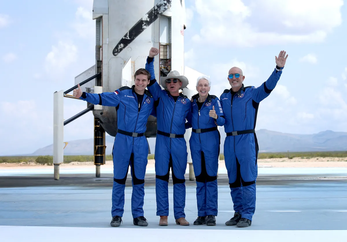 Blue Origin’s New Shepard crew (L-R) Oliver Daemen, Jeff Bezos, Wally Funk, and Mark Bezos pose for a picture after flying into space in the Blue Origin New Shepard on July 20, 2021 in Van Horn, Texas. Mr. Bezos and the crew that flew with him were the first human spaceflight for the company © Joe Raedle/Getty Images