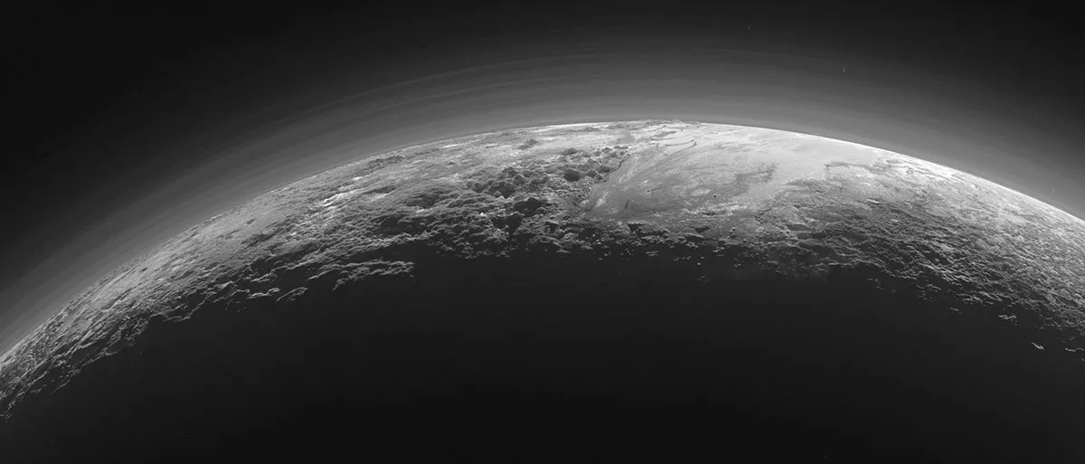 A photo captured by NASA's New Horizons spacecraft, showing Pluto's mountains and icy plains © NASA/Johns Hopkins University Applied Physics Laboratory/Southwest Research Institute