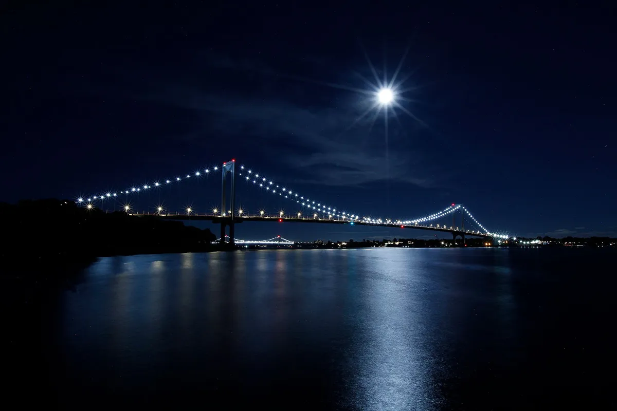 Mandatory Credit: Photo by Michael Forster Rothbart/ZUMA Press Wire/Shutterstock (12455161b) The harvest full moon rises over New York CityÃs Whitestone bridge on September 20, 2021, as seen from nearby Ferry Point Park. The bridge crosses the East River between the Bronx and Long Island..Photo by: Michael Forster Rothbart.Date: 9/20/2021.File#: 21-C13739 USA News, Bronx, NY, U.S. - 20 Sep 2021