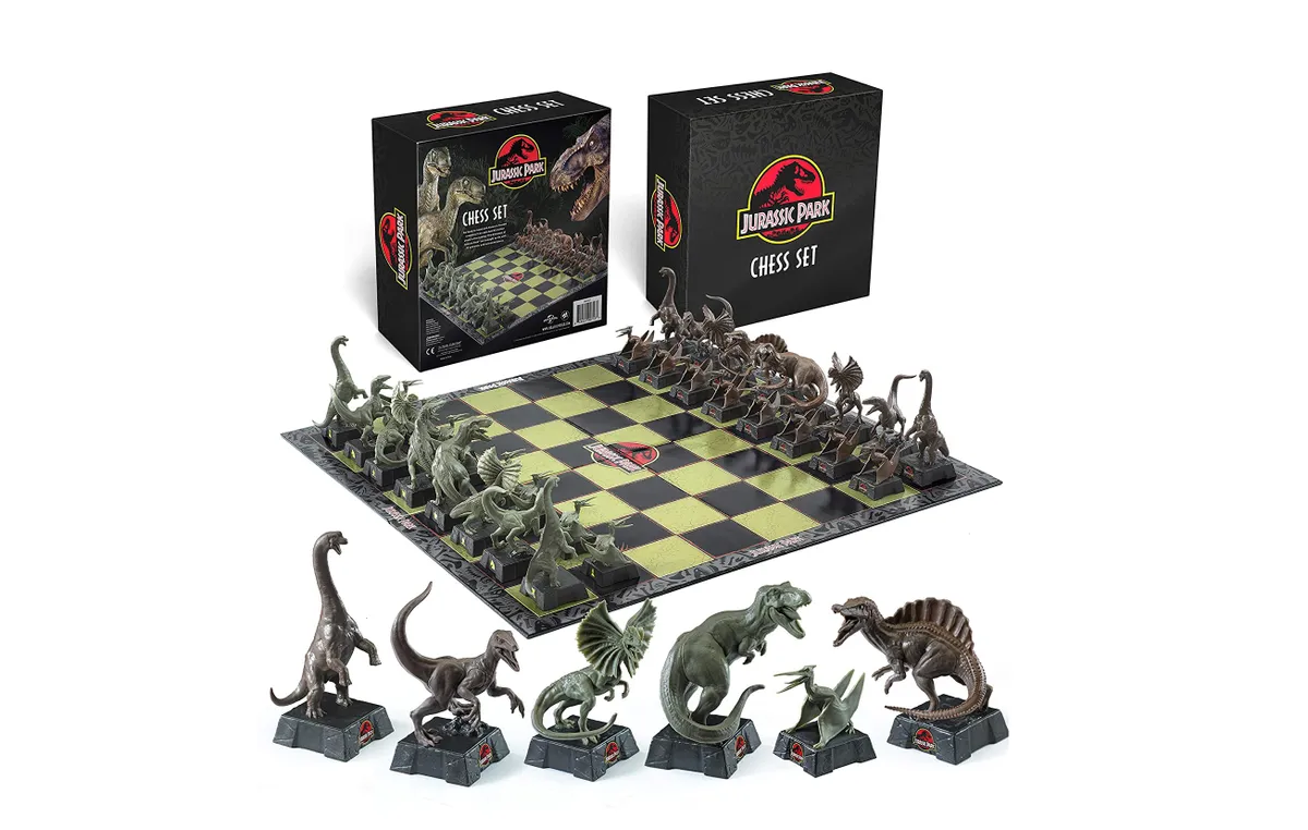 The Noble Collection Jurassic Park Chess Set on white background