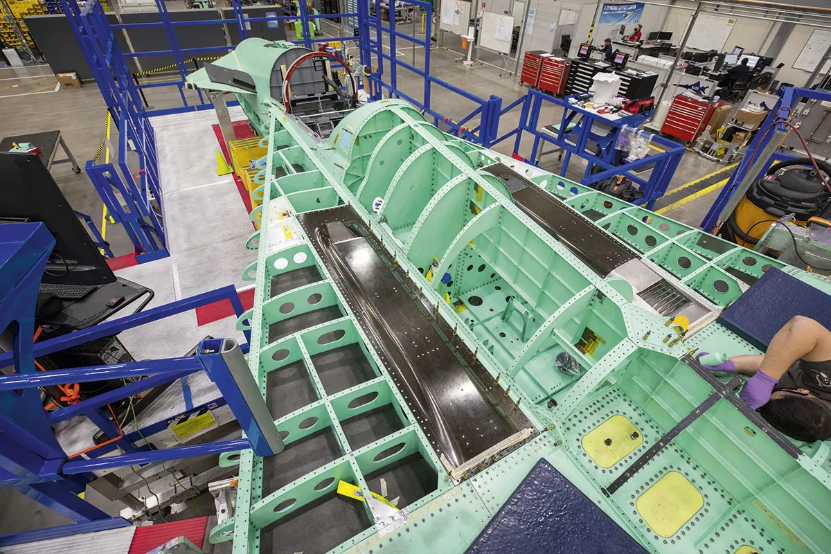 The fuselage of the X-59, showing black rectangular panels and a silver grate © Lockheed Martin