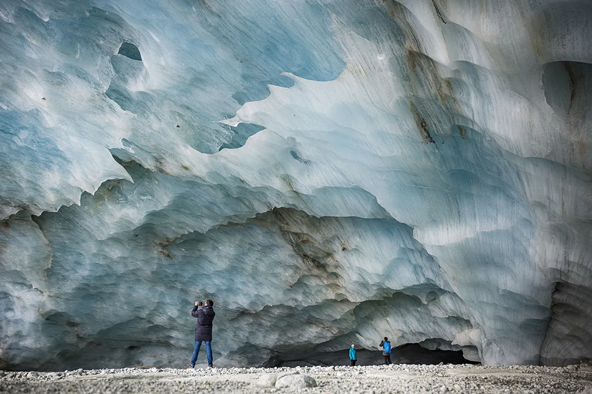 ATTENTION: This Image is part of a PHOTO SET Mandatory Credit: Photo by VALENTIN FLAURAUD/EPA-EFE/Shutterstock (12602438ad) Hikers visit an ice cave formed at the end section of the Zinal glacier, above the alpine village of Zinal, Switzerland, 13 November 2021. Over the last 60 years the overall glacier volume in Switzerland has shrunk by almost 50 percent loosing between 2 percent and 3 percent volume per year over the last four years according to the GLAMOS (Glacier Monitoring in Switzerland project). Overall glacier volume in Switzerland has shrunk, Zinal - 13 Nov 2021