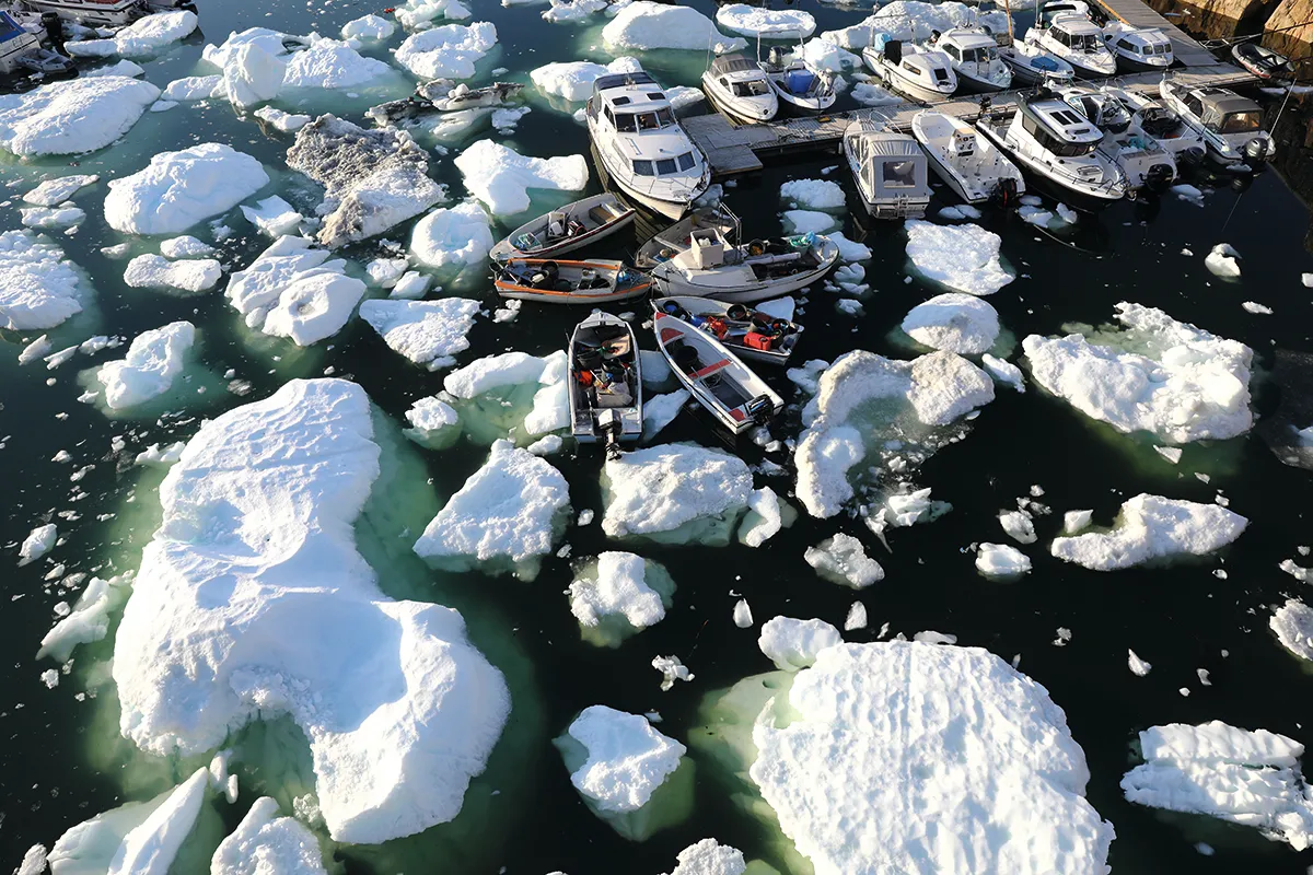 Large amounts of floating ice inundates harbour in Greenland