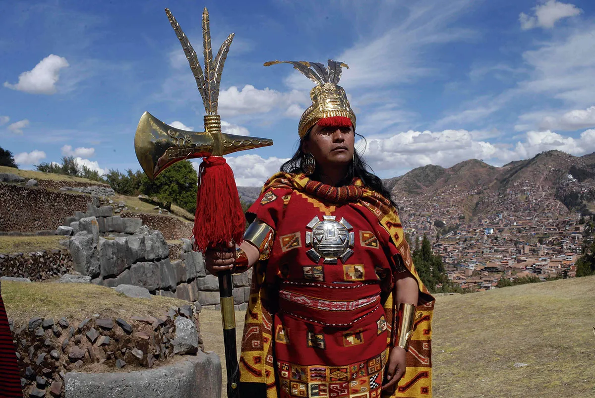 A person wearing traditional Incan dress