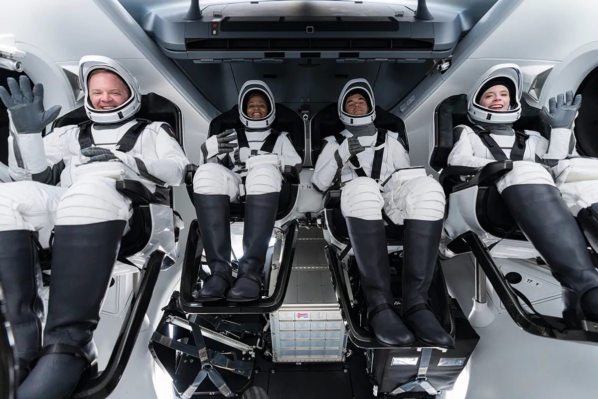 Space Tourists ready for launch in cabin