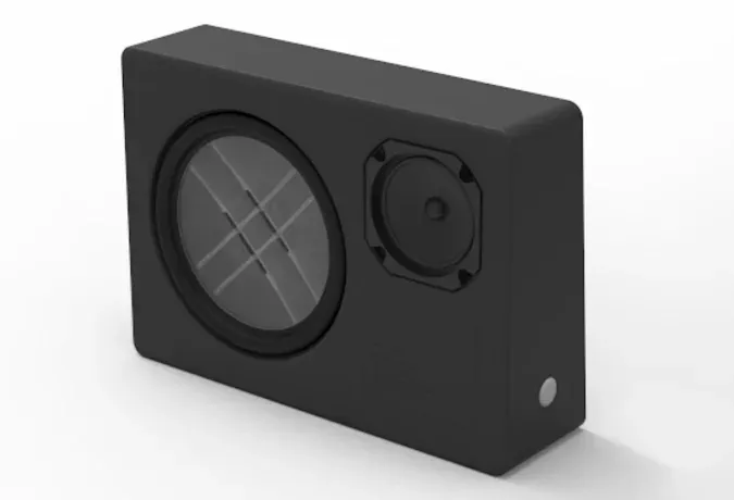 Mayht speaker in front of grey background