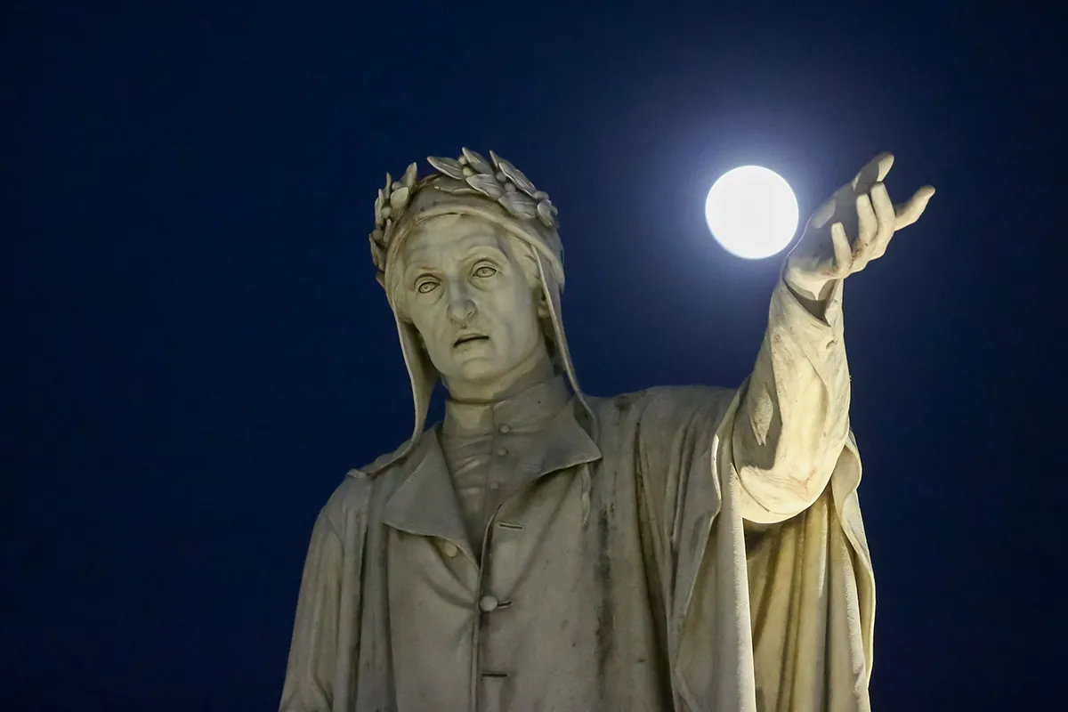 dante statue with full Moon