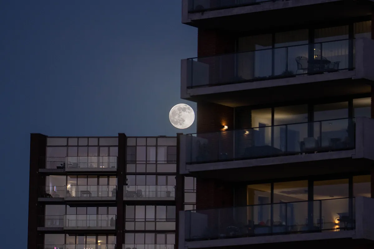 Full Moon above apartments