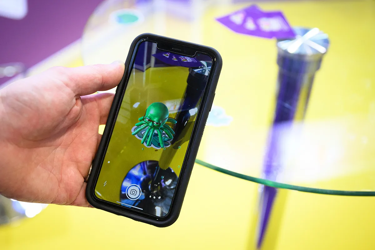 An AI interactive squid by Holo Toyz is seen on a mobile phone at the Toy Fair 2022 on January 27, 2022 in London, England. The 2022 London Toy Fair is the only international toy trade event this year with others being canceled due to the Coronavirus Pandemic. (Photo by Leon Neal/Getty Images)