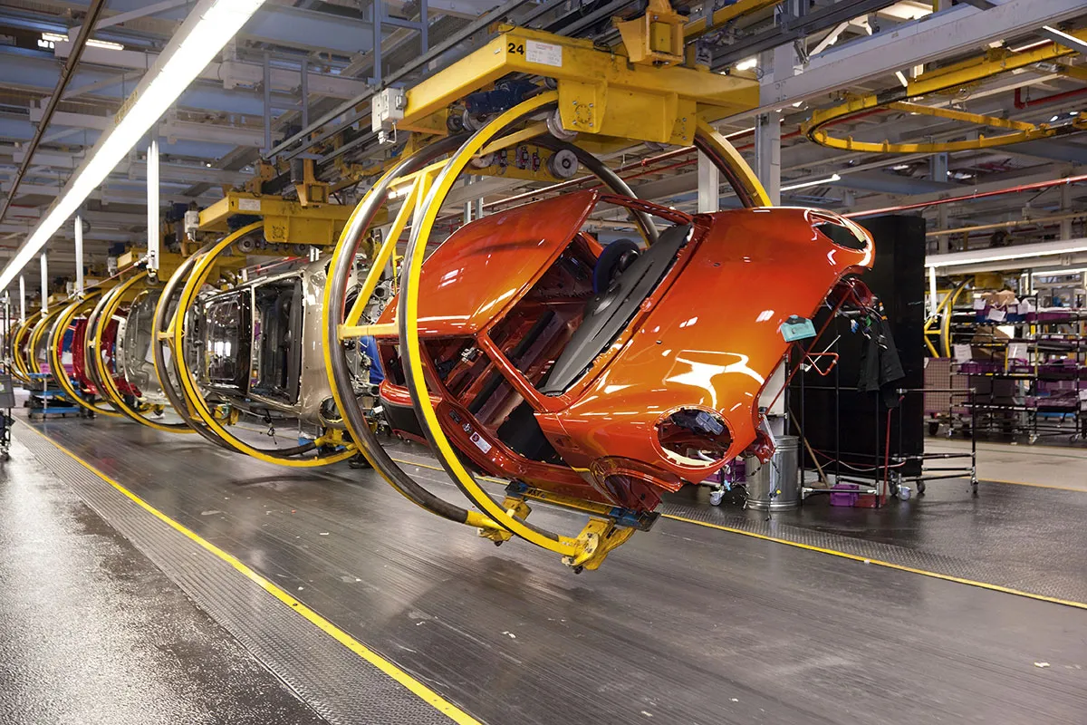 Minis being built by robots in a BMW factory