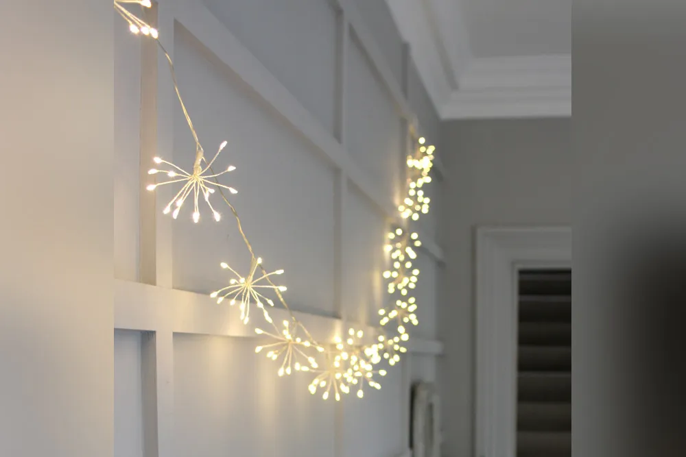 Starburst silver fairy lights in a hallway