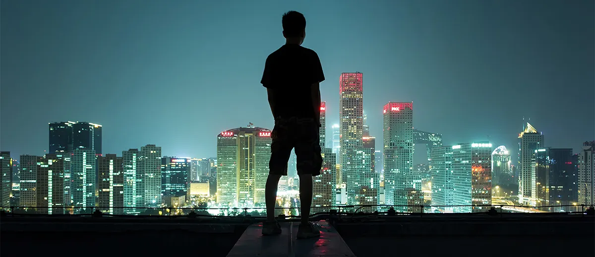 Beijing skyline young man silhouette