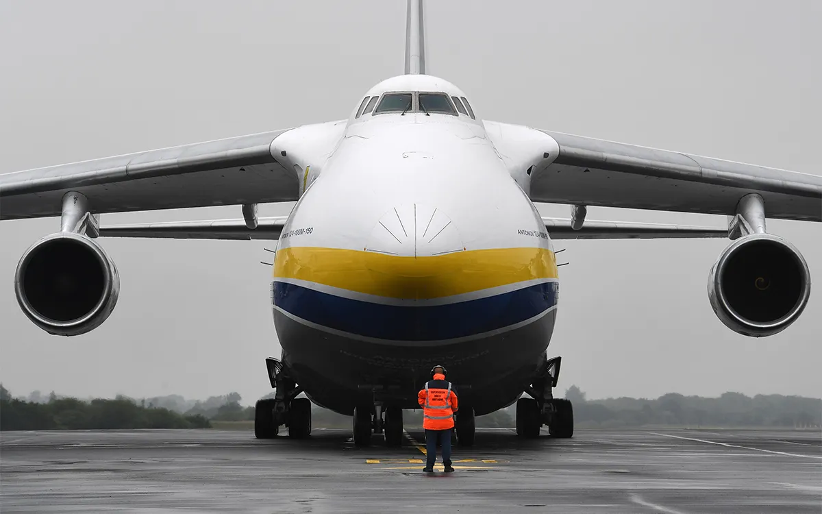Man standing in front of huge plane
