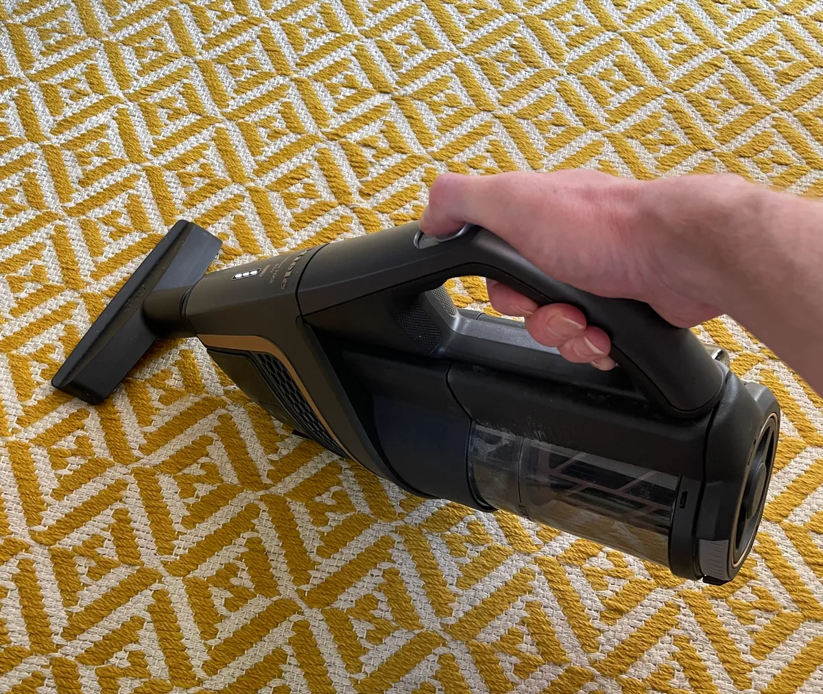 Miele HX2 Pro in handheld mode with upholstery nozzle