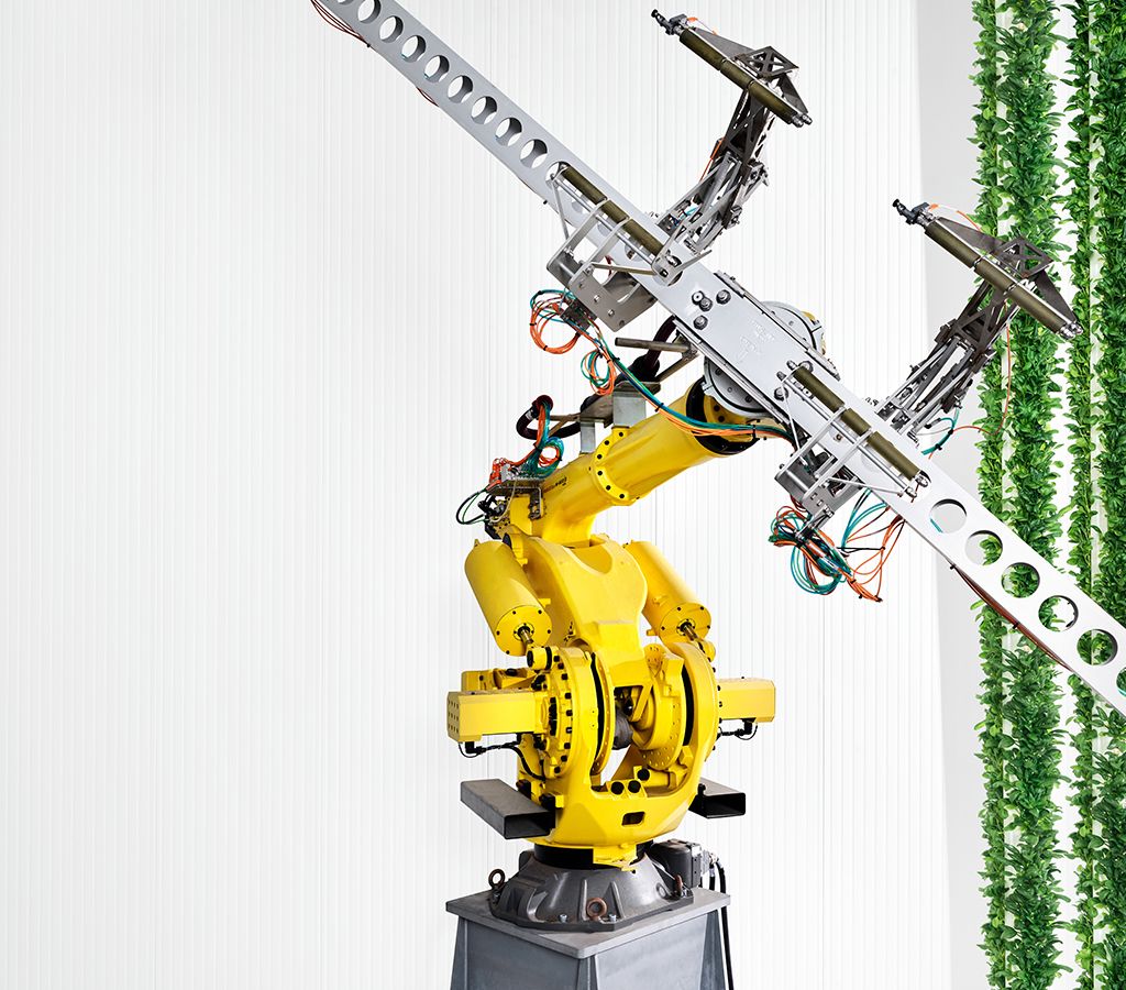 yellow metal robot arm