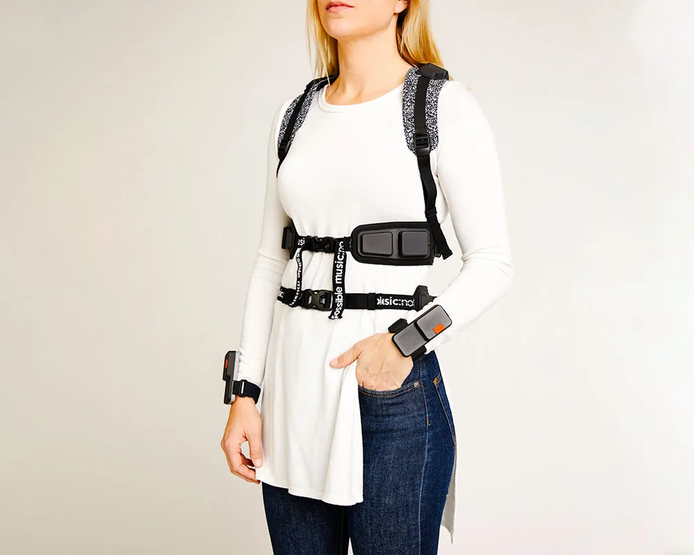 Front view of woman wearing the NotImpossible vest with straps tied up
