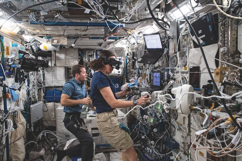 A photograph of NASA astronaut Megan McArthur in zero gravity