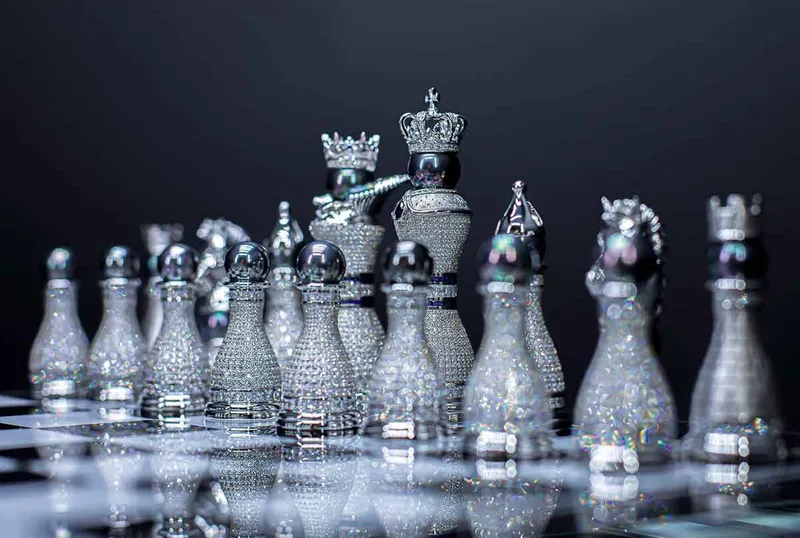 A solid diamond chess set complete with glass table