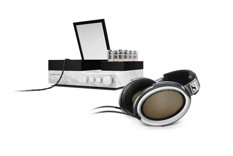 Sennheiser headphones with a large amplifier sat behind
