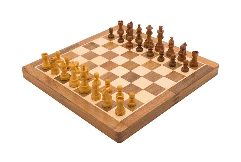 A wooden chess set shot from above