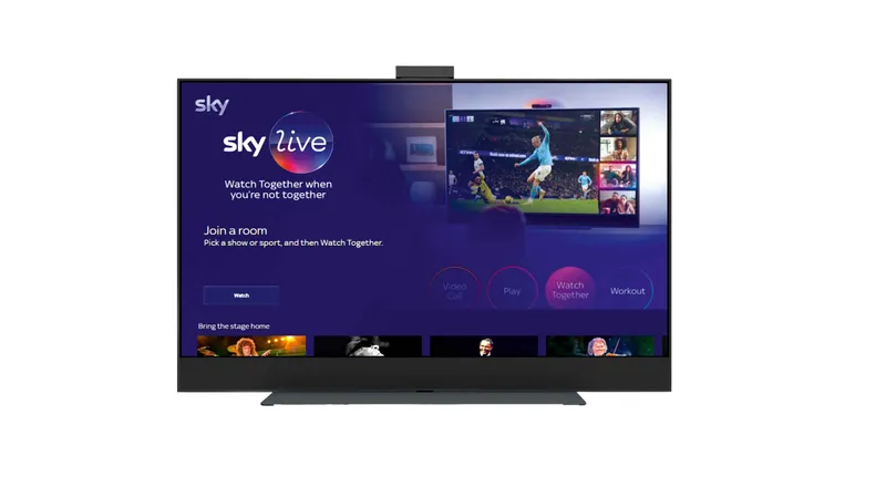 The Sky Live TV from in front turned on with the Sky home screen.