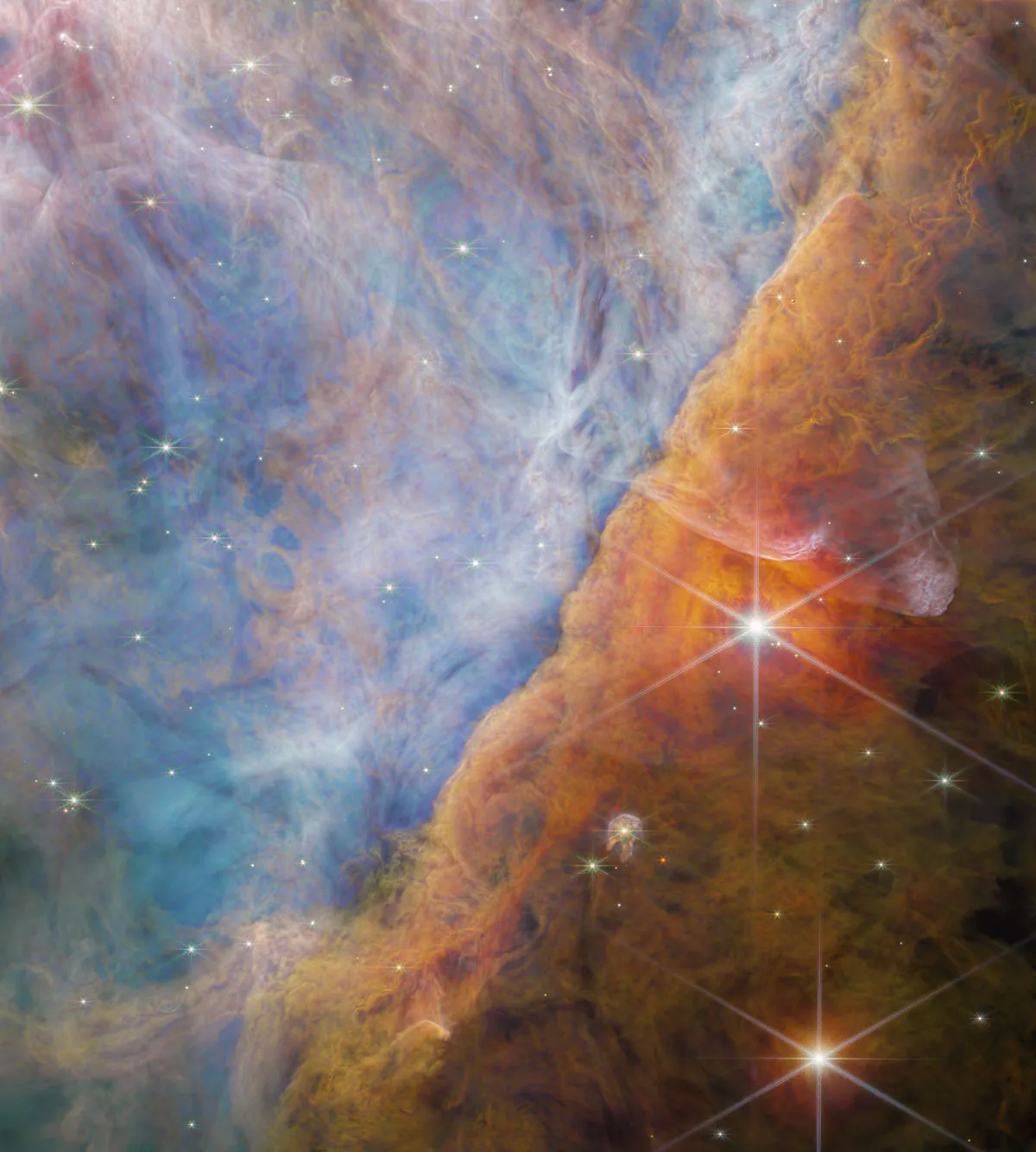 The Orion Bar region space nebula, pictured by the James Webb Space Telescope