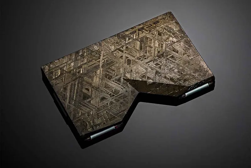 Bejeti's wallet made from meteorites laid out on a black background