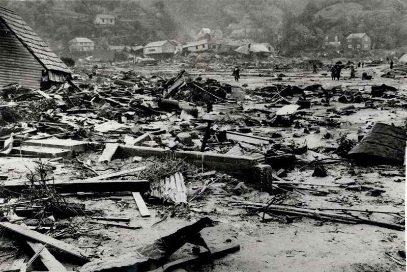 Black and white image of devastated buildings
