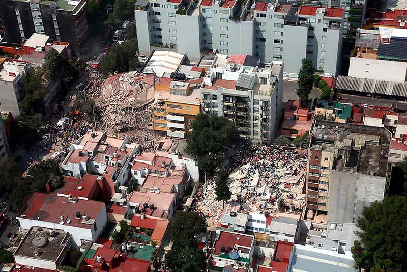 A large section of a city flattened by an earthquake