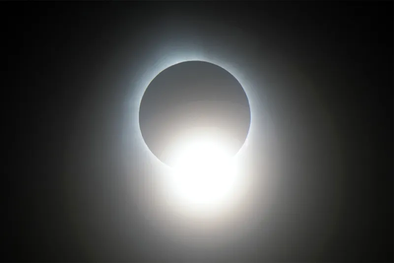 Total solar eclipse with big light beaming.