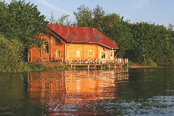 A log house on a lake