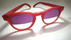 A pair of red vintage sunglasses