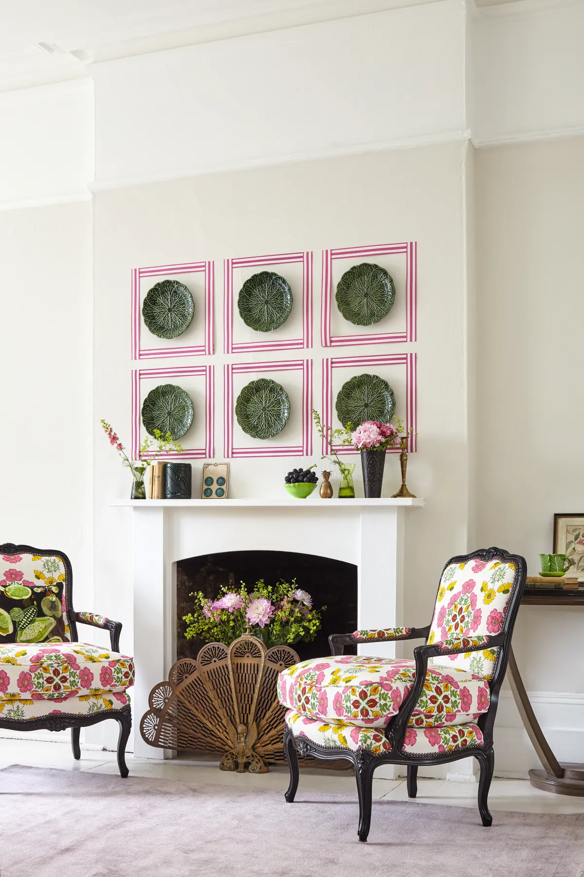 Create a focal point on a wall by hanging antique cabbageware plates and framing with neon washi tape