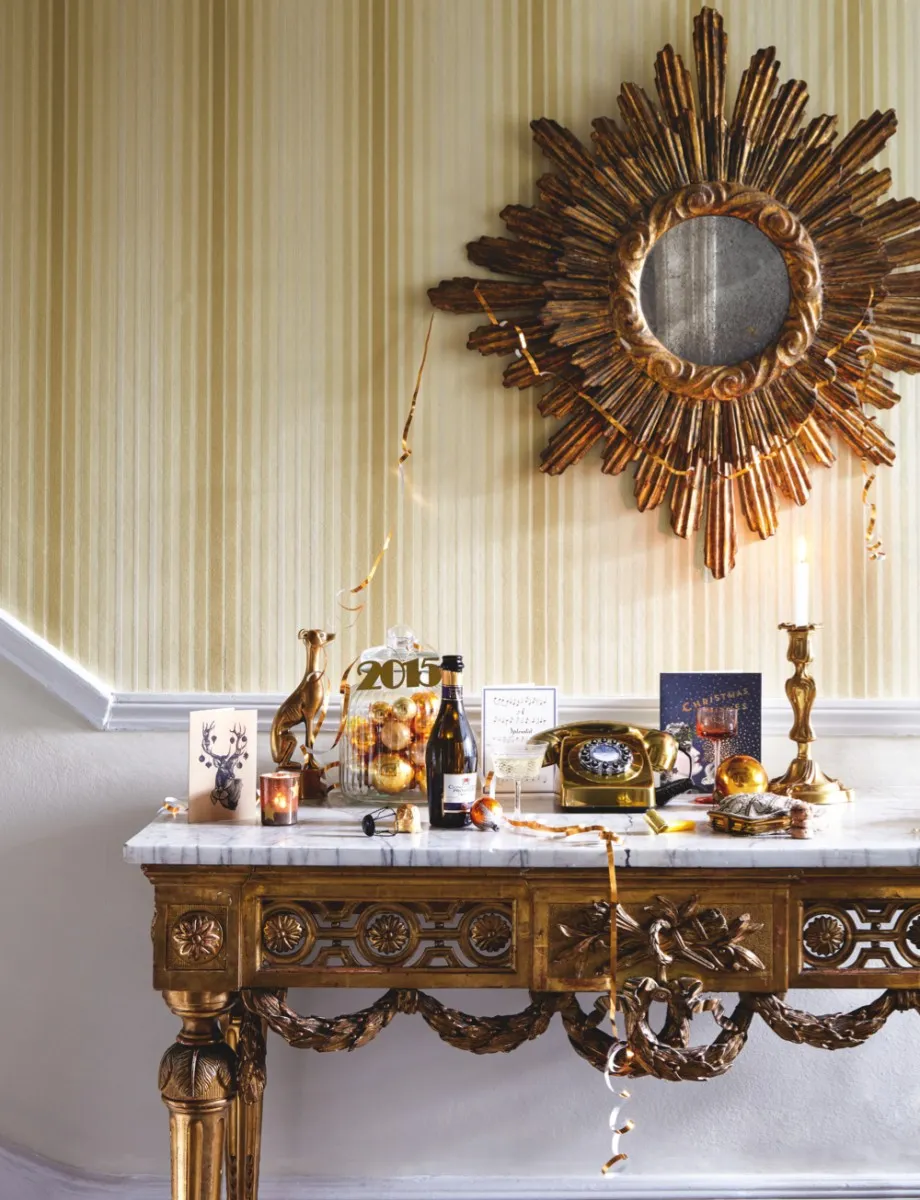 French mirror, £1,800, Maison Artefact. 'Lexington' 311021 wallpaper, £81 per roll, Zoffany. Gilded Louis XVI console, c1790, £11,000, Guinevere