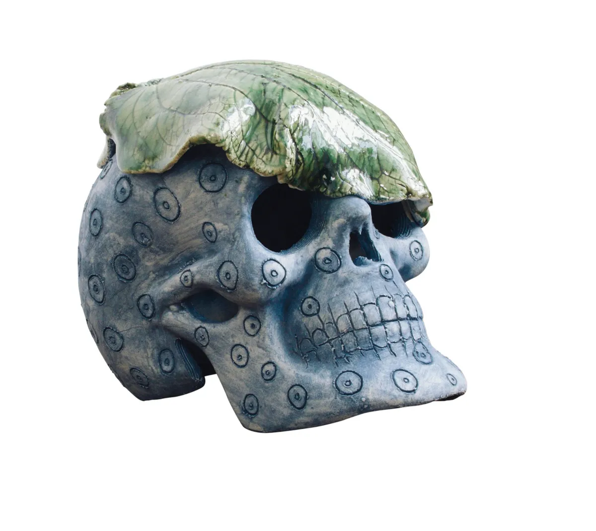 Antique blue and green ceramic skull with cabbage leaf
