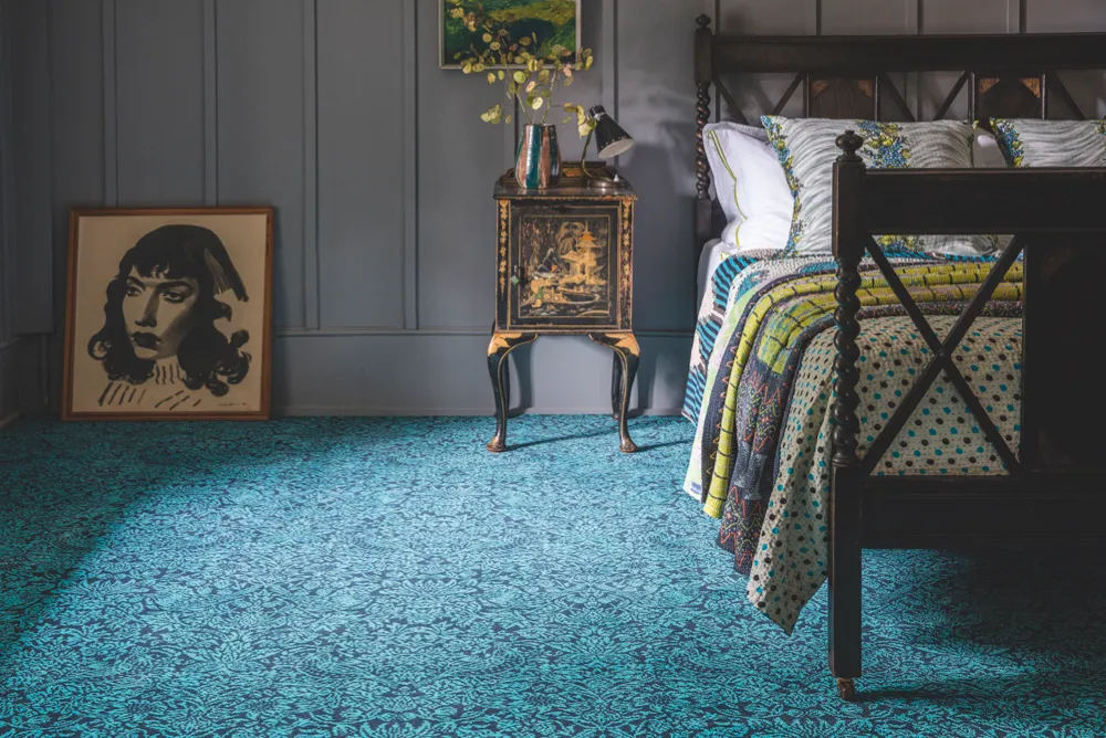 ‘Strawberry Meadow Peacock’ carpet, 100 per cent wool, £149 per sq m, Quirky B Liberty Fabrics, Alternative Flooring
