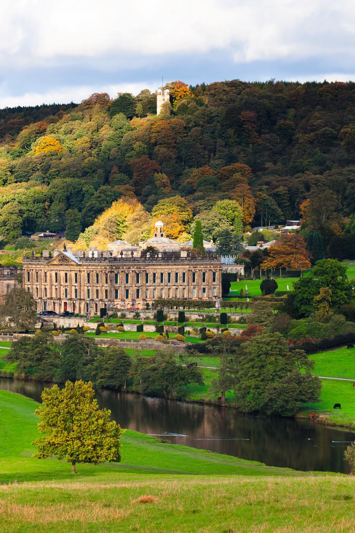 A view of Chatsworth House and Hunting Tower from across the River Derwent