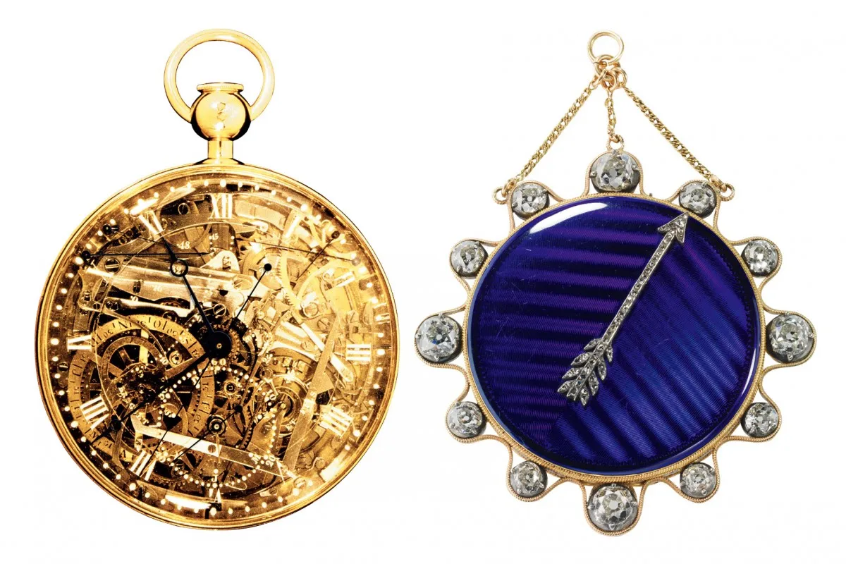 Two different pocket watches. One with a gold face and the other with a purple face