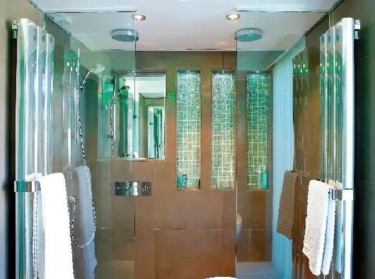 A shower with ceiling downlights