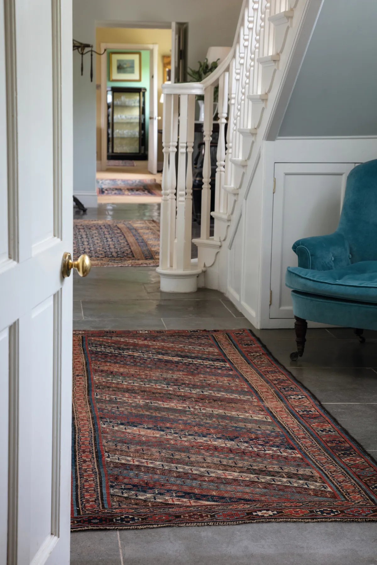 With mellow colours and worn soft with age, antique or vintage runners are perfect in period properties. A selection of vintage runners, £POA, London House Rugs.
