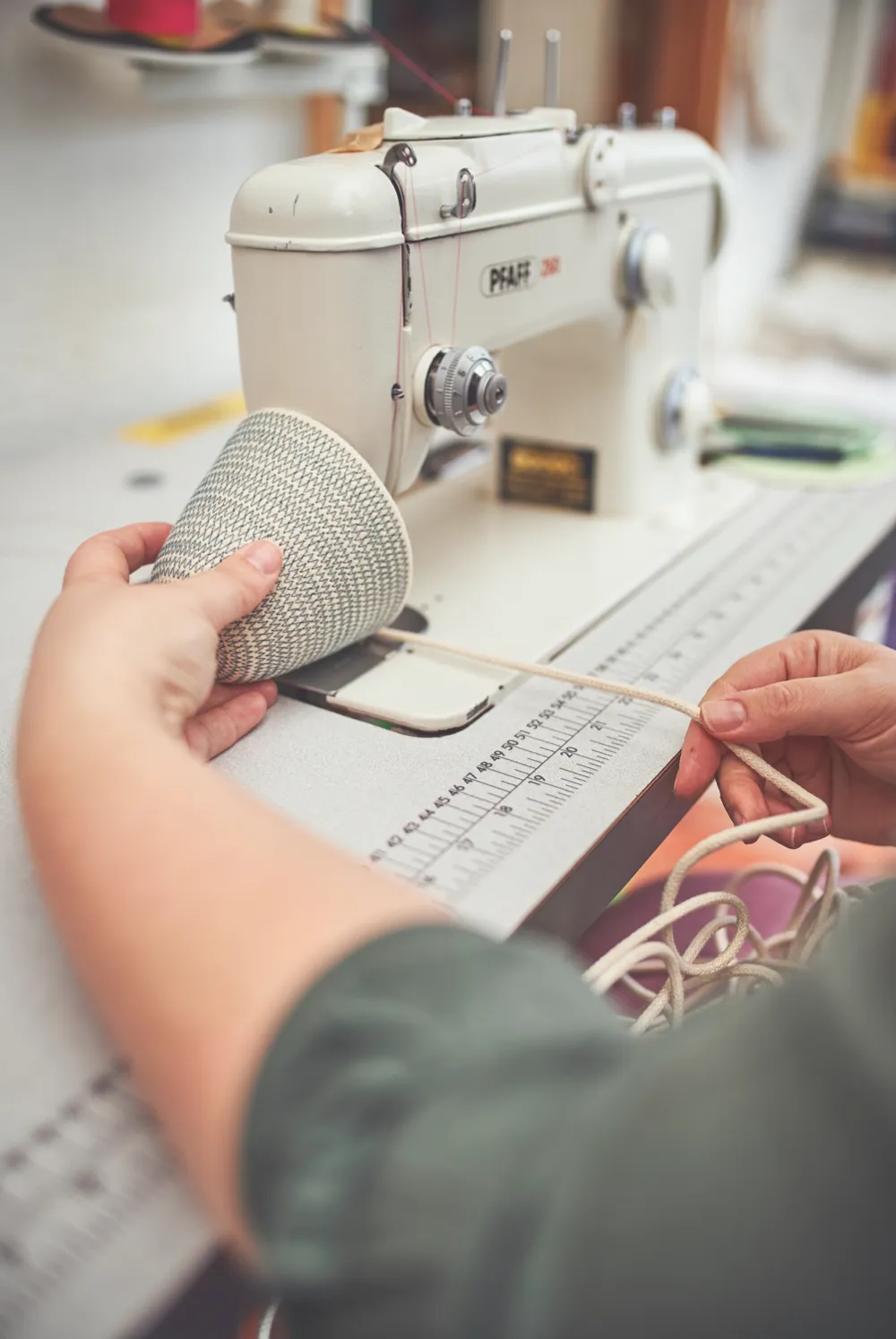 Jessica Geach stitching pieces by machine