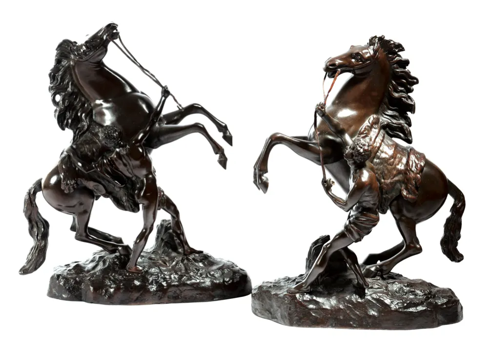 A pair of late 19th-century bronze Marly horse groups, after Guillaume Coustou, est £500-£700, at auction on 3rd July at Woolley & Wallis