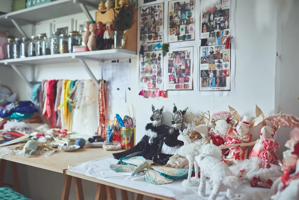 A collection of Alice's delicate dolls sat in her Somerset-based studio