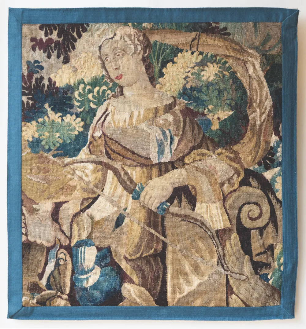 A mid 18th-century tapestry fragment (£3,200, Julia Boston Antiques)depicting goddess of hunting, Diana, and her bow.